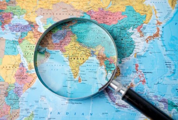 offshore-development-center-in-india.jpeg Magnifying glass focused on map of India for offshore development center